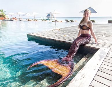 Female Mermaid In The Maldives